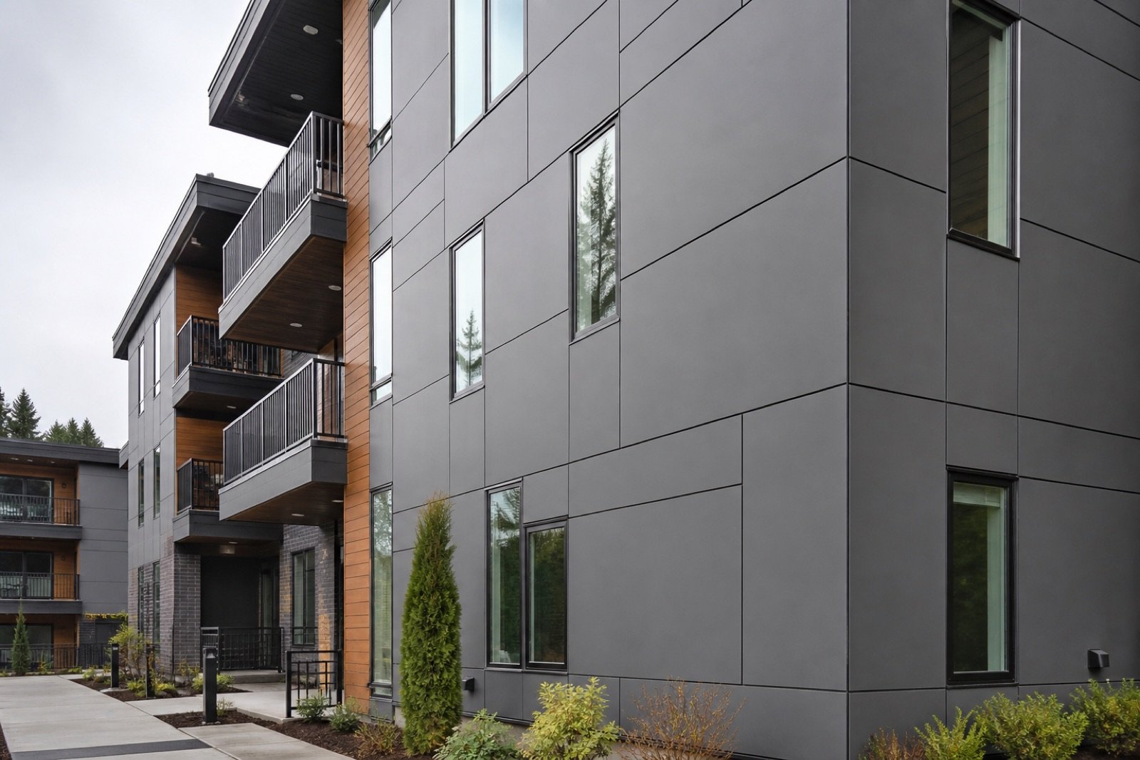 Modern HPL architectural facade panels on a multi-family building