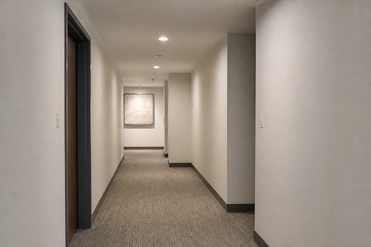 Common area drywall repair after flood — completed